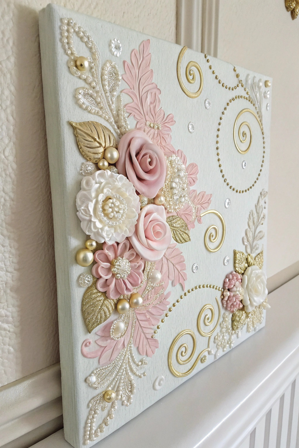 Delicate pearl accents and lace details add soft romance to your walls.
