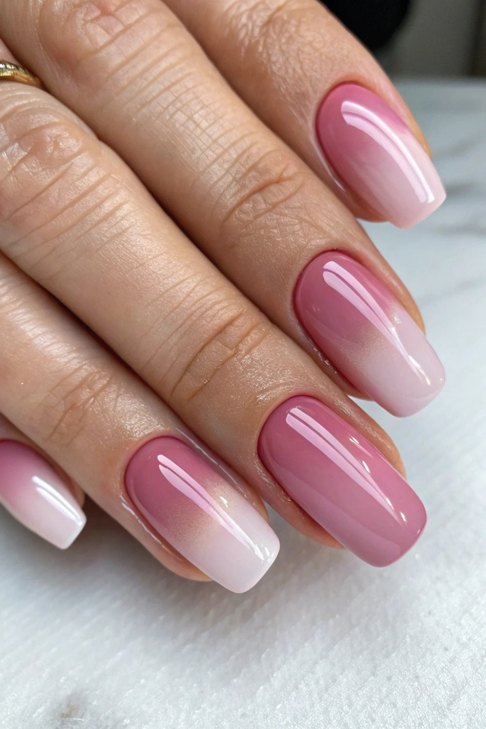A sophisticated yet soft ombre featuring mauve and rose pink hues.